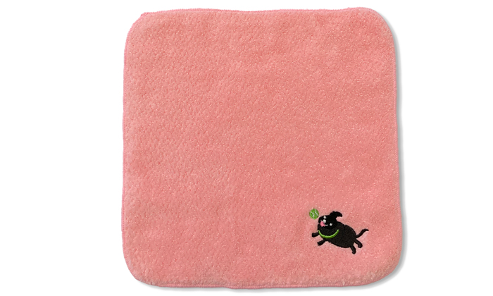 ピーチピンク色のタオルの写真