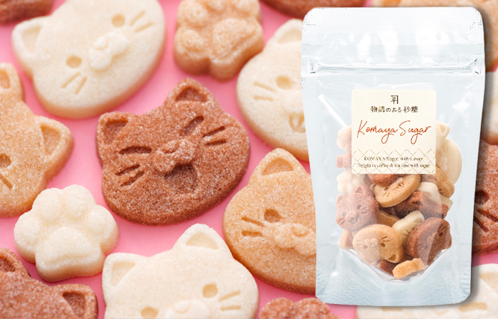 にゃんこはニャーといってそうな顔、すました顔、ちょこっと舌を出して笑っているような顔と肉球の型