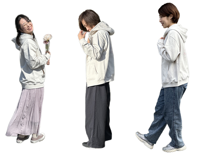 それぞれの身長の三人が並んでいる写真
